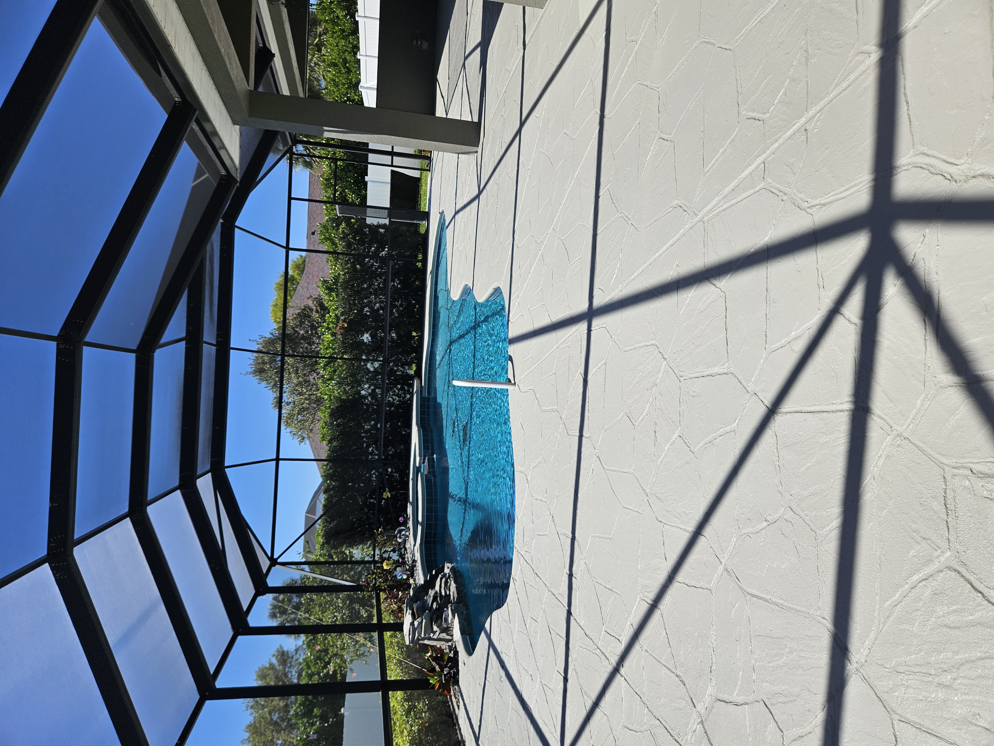 Pool deck and outdoor living surface coating